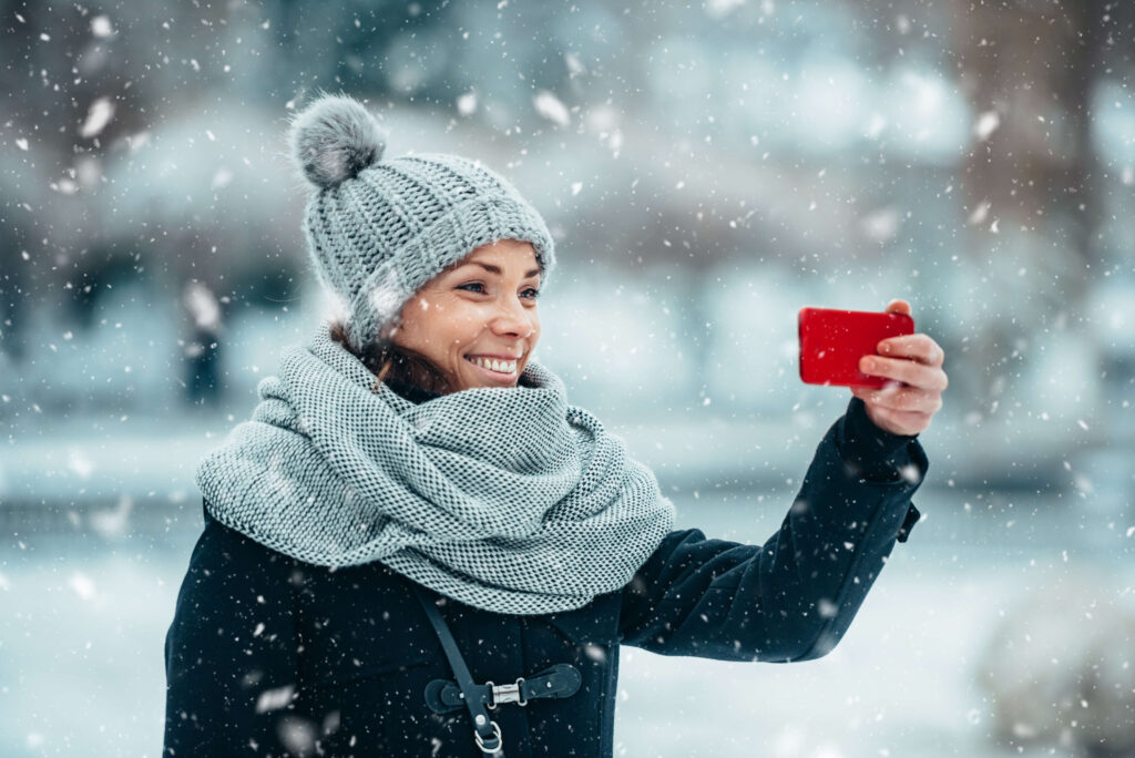 Women taking selfie in winter